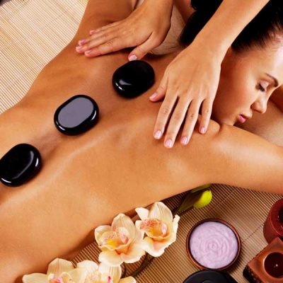 Get a hot stone massage at Massage Masters